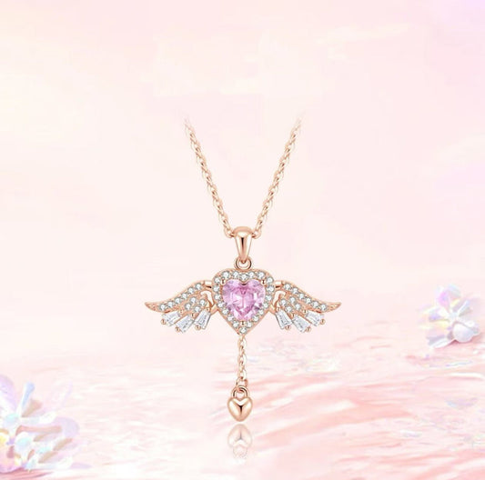 Heart Necklace With Moving Wings And A Clavicle Chain